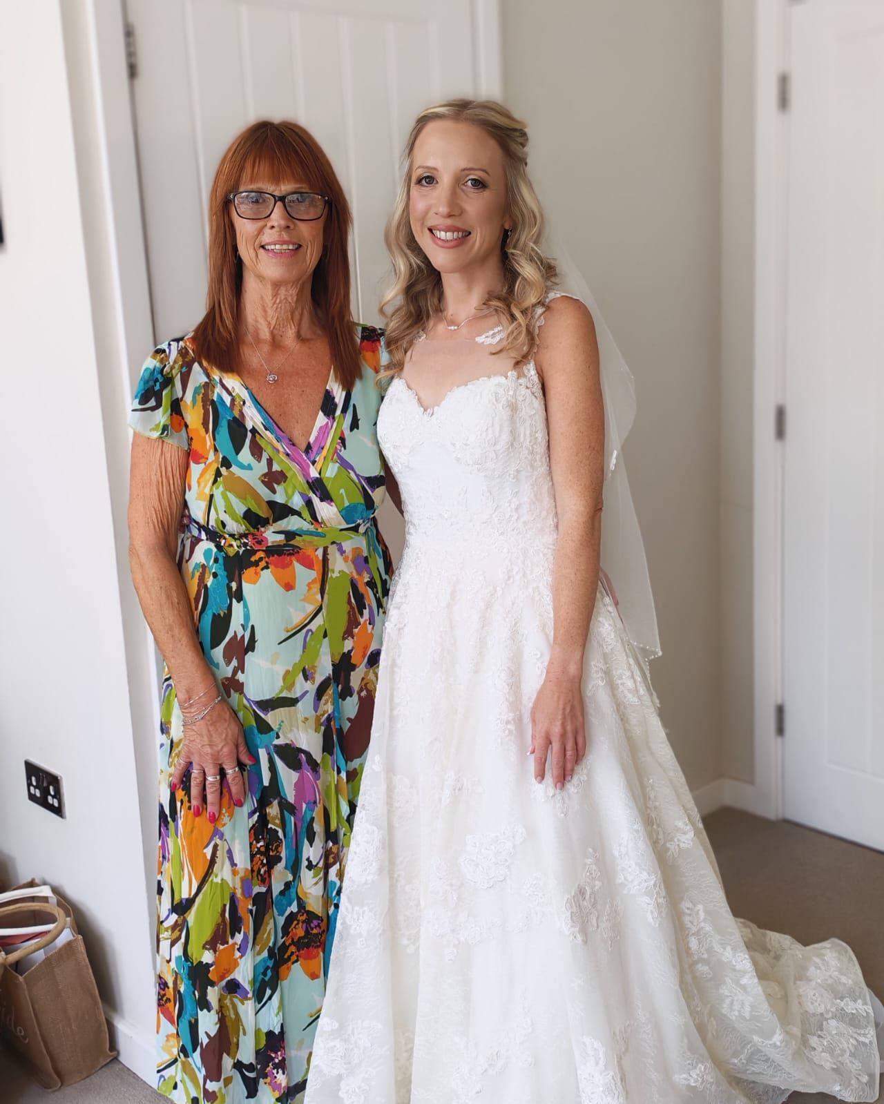 Bride and her mum together on the wedding morning