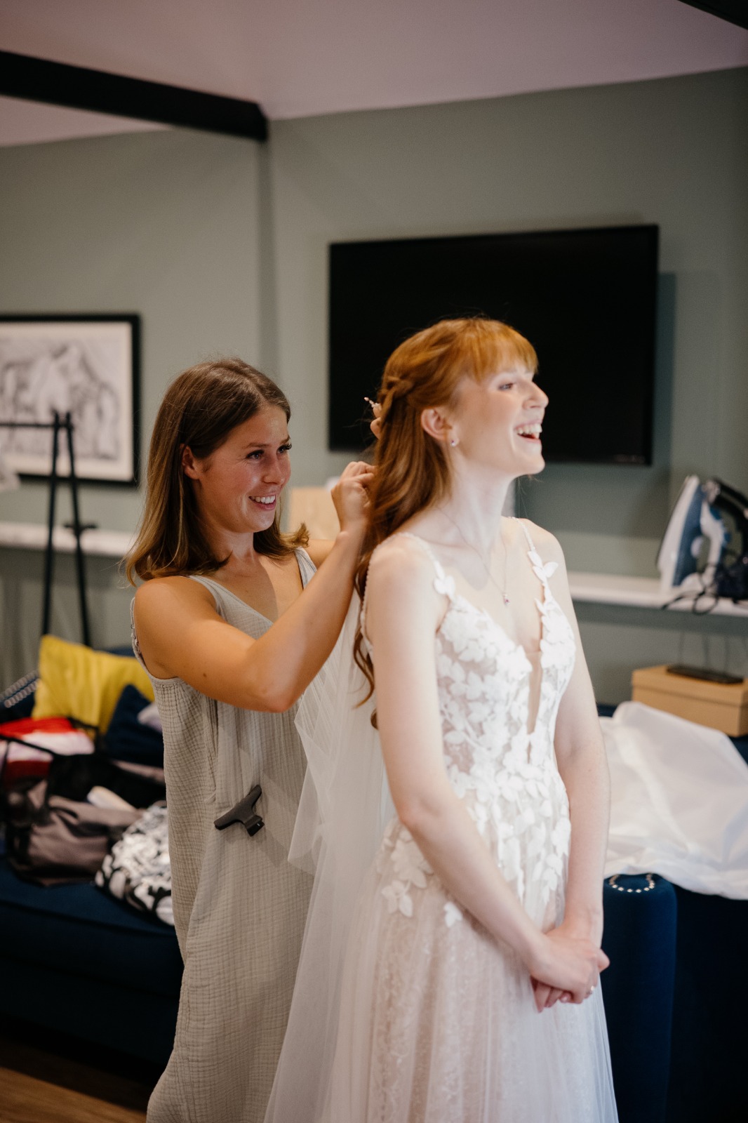Lauren styling hair for the bridal party on the wedding morning